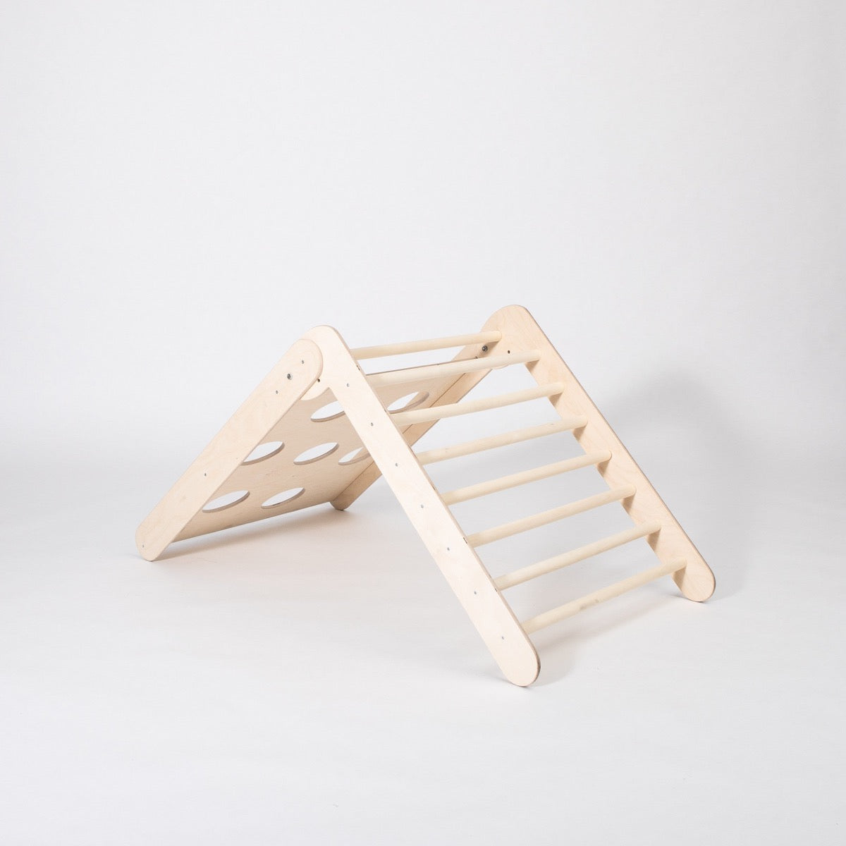 Wooden climbing triangle in gentle slope configuration with rounded top detail