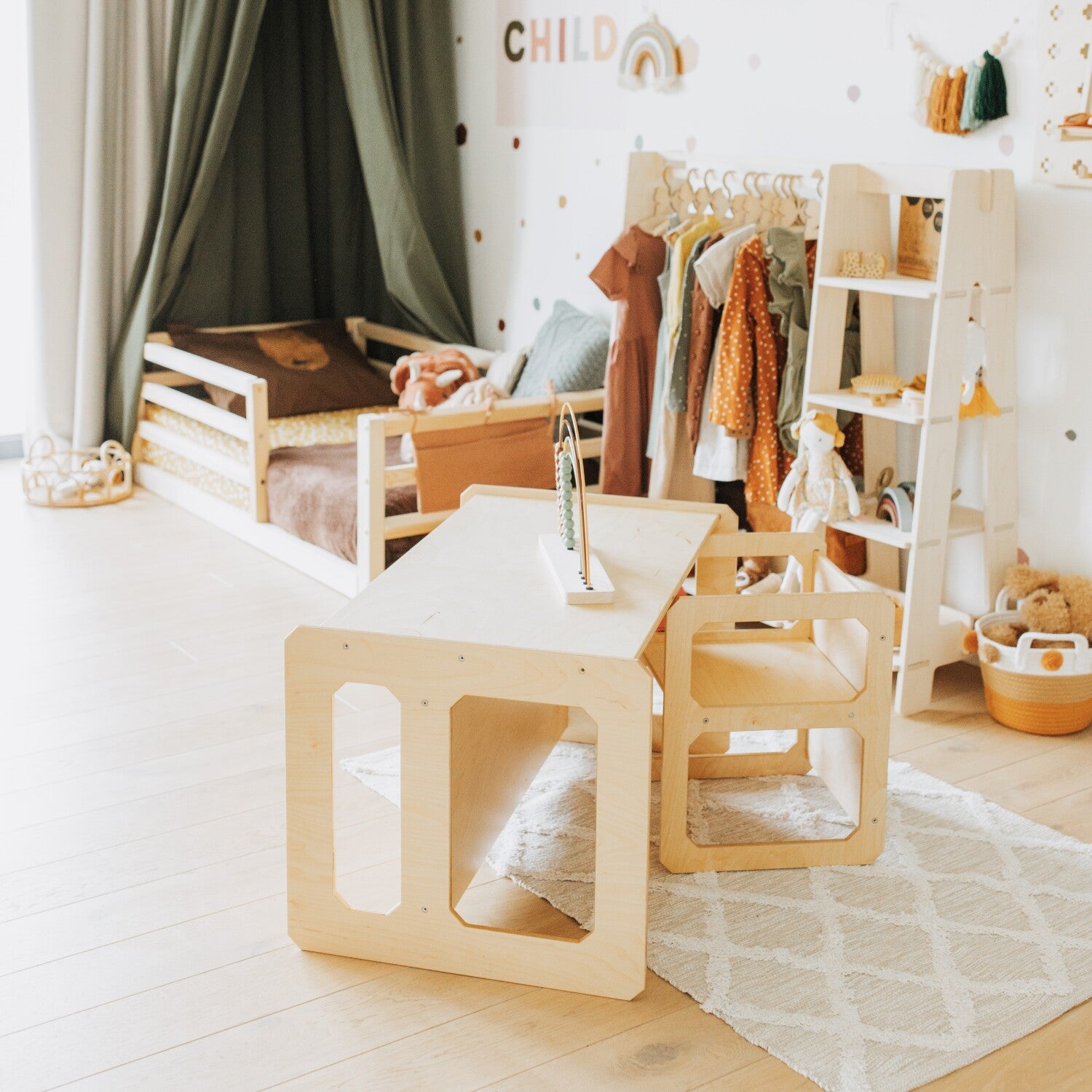 Light wood Montessori weaning table and matching chair in bedroom play space