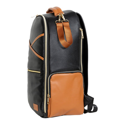 Large vegan leather diaper bag in black with cognac leather details, side angle view