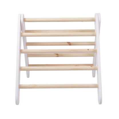 White wooden climbing wall with horizontal wooden rungs, rear view