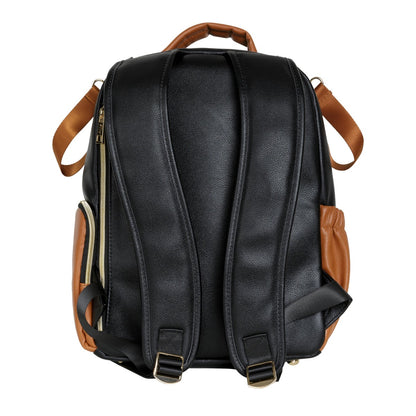 Interior view of open diaper bag displaying white changing pad and storage compartments