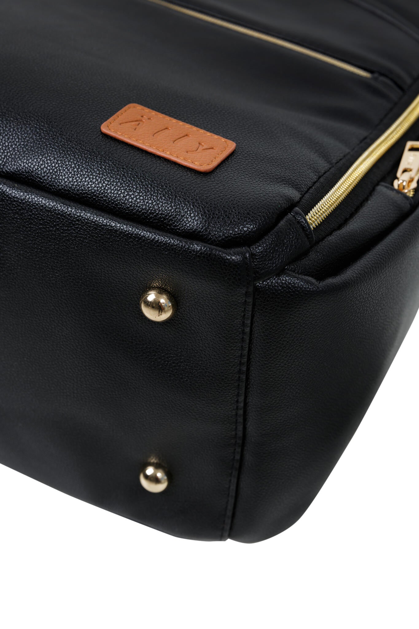 Tan leather patch detail on black Ally Scandic diaper bag