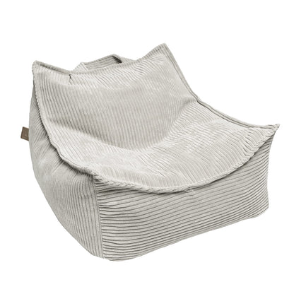 Ecru velvet bean bag with ribbed texture and soft molded shape for toddler seating