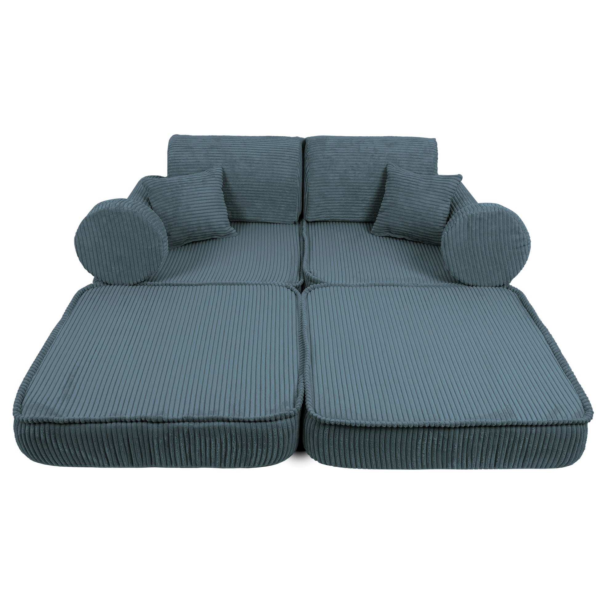 Top view of turquoise kids sofa showing flat bed configuration with accent pillows