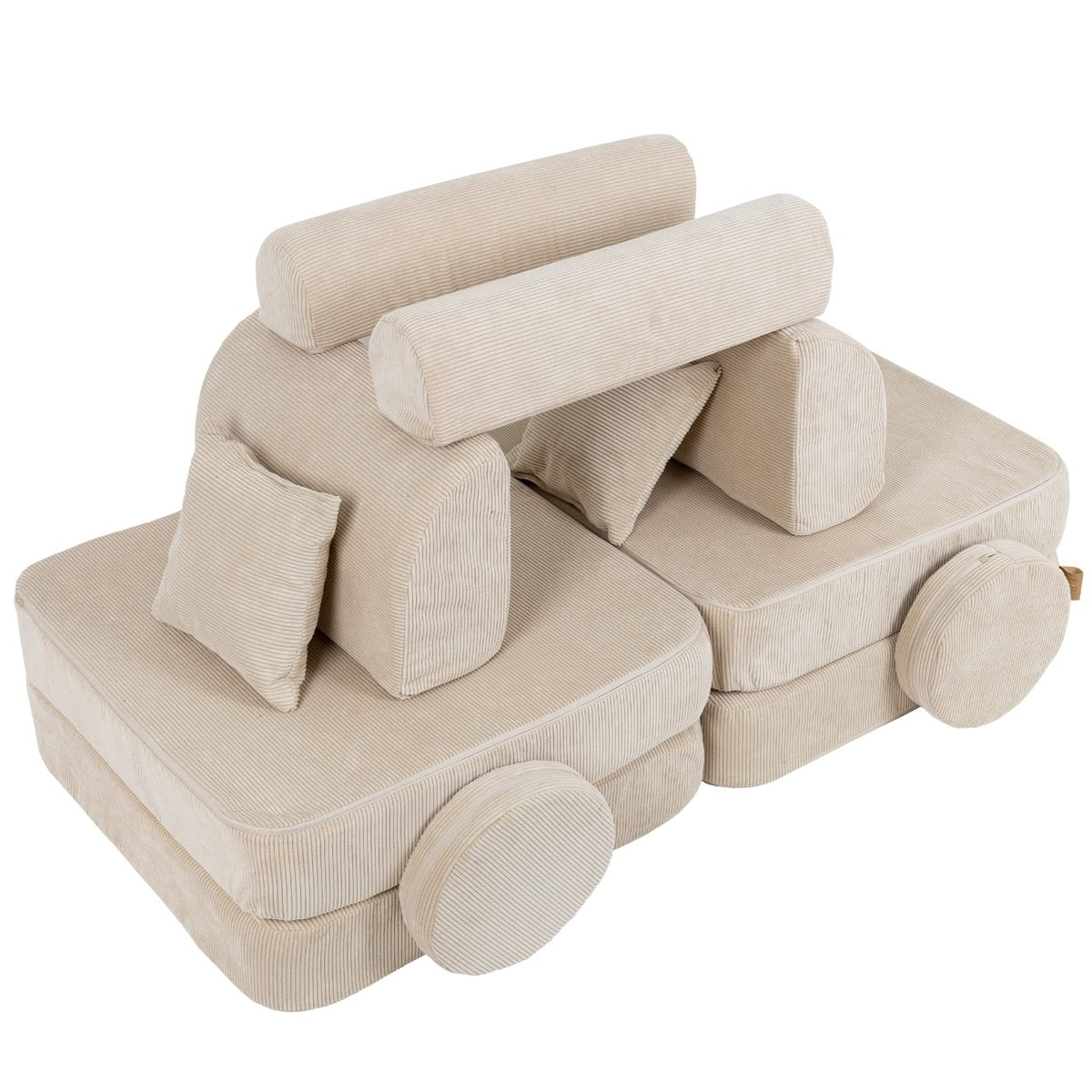 Modular sofa components separated showing individual seat modules, bolster pillows and cushions