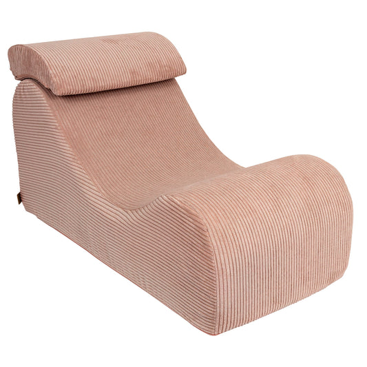 Wave Lounger in powder rose with ribbed texture and curved design, side view