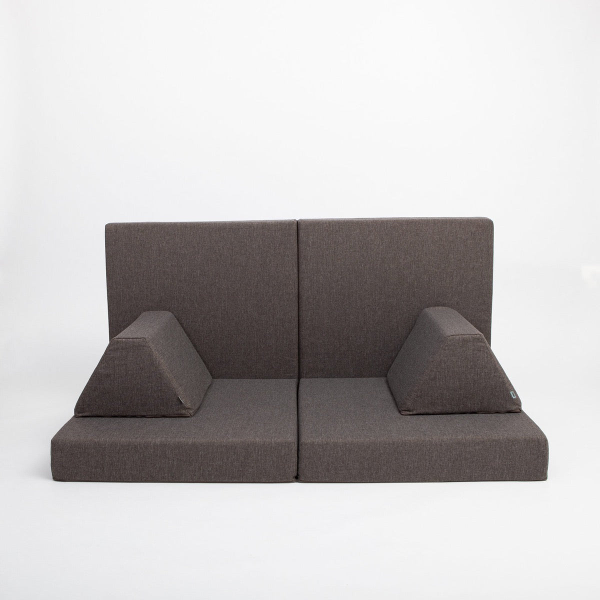 Dark brown activity mattress set configured as sofa seating with two cushions and backrests