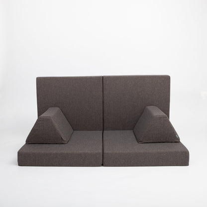 Dark brown activity mattress set configured as sofa seating with two cushions and backrests