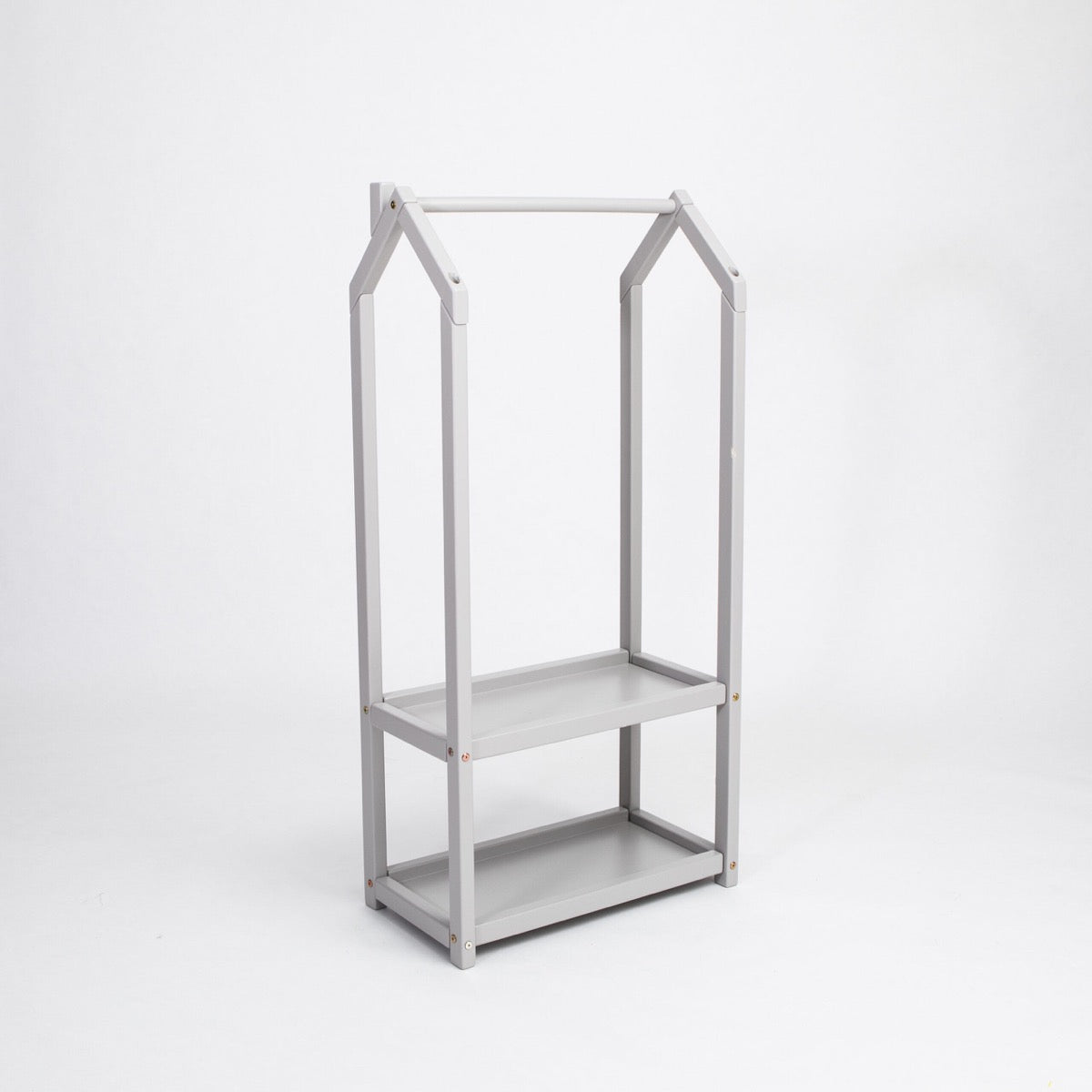 Gray wooden house-shaped clothing rack with two open storage shelves, side angle view