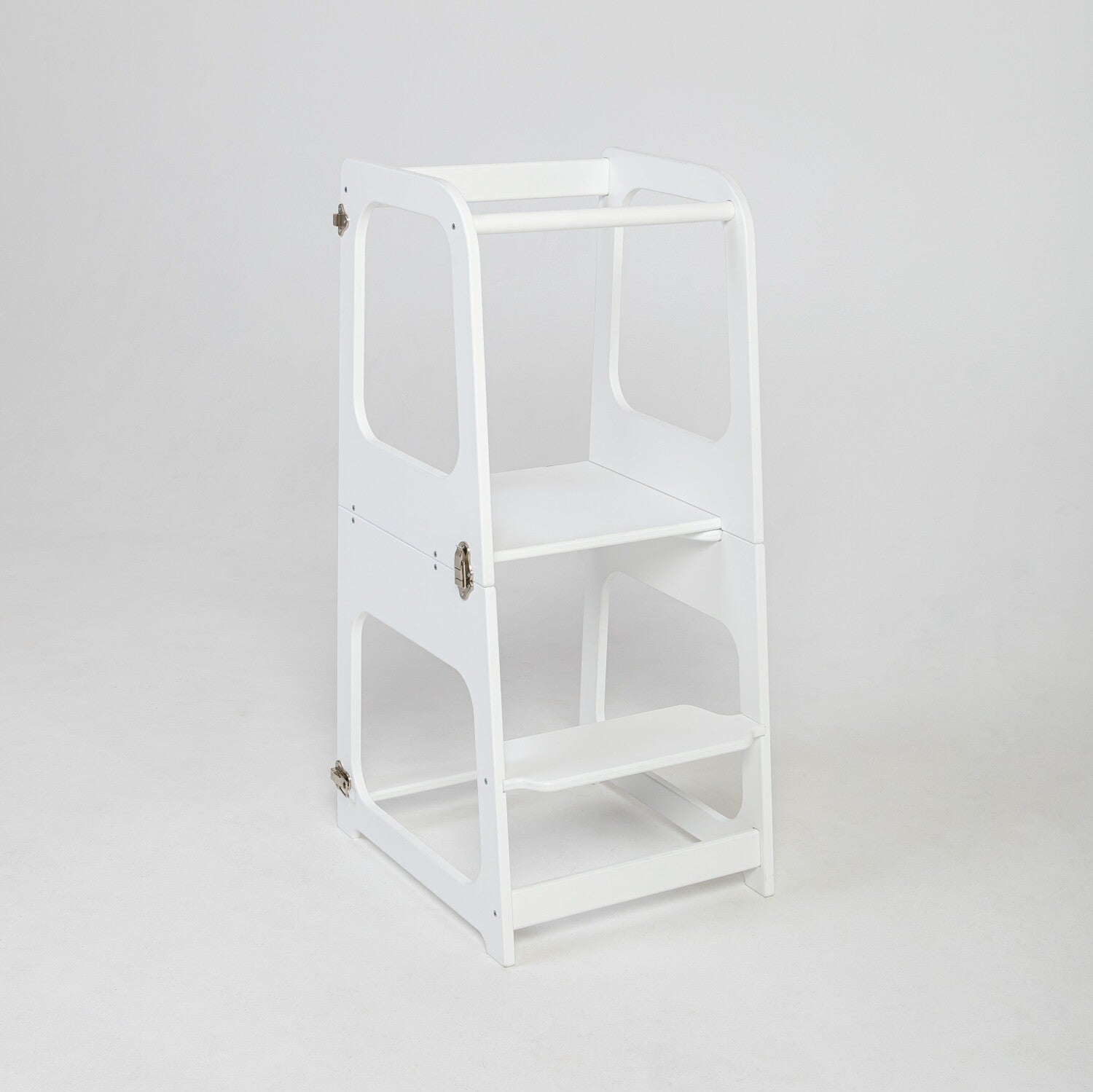 White Montessori kitchen tower in upright position with three shelves