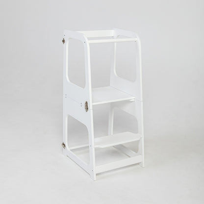 White Montessori kitchen tower in upright position with three shelves