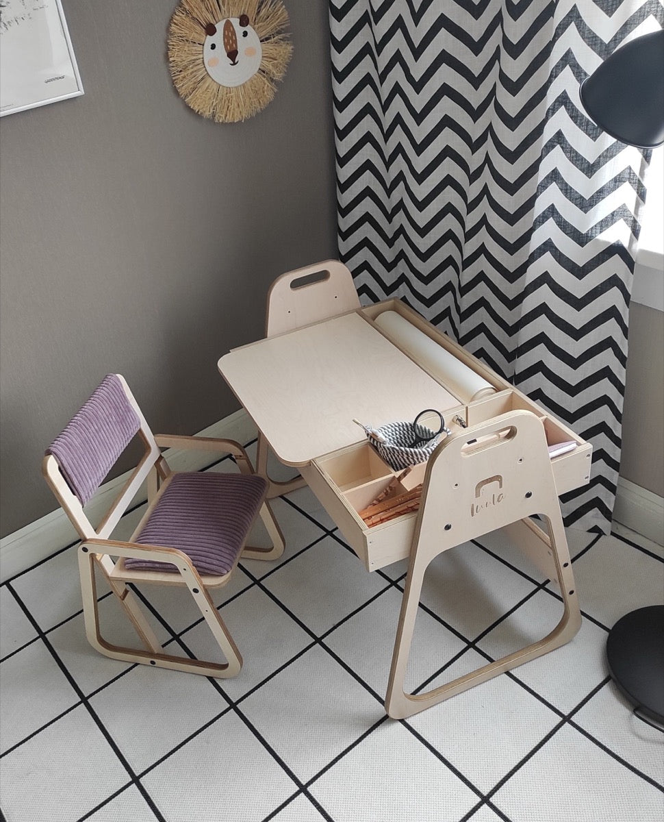 Cannon pink Montessori table and chair set in playroom with gray and white decor
