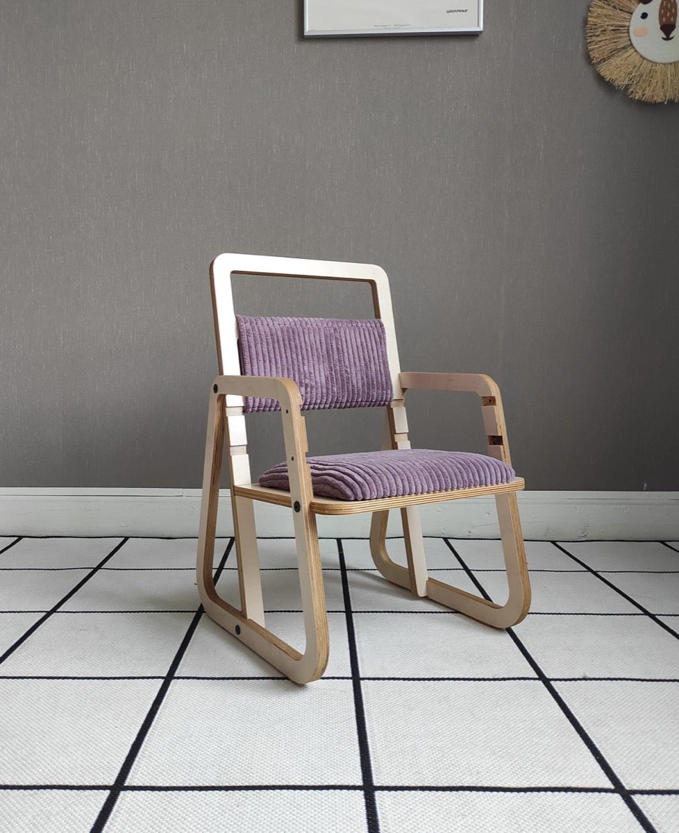 Cannon pink Montessori chair with white frame and padded seat viewed from front