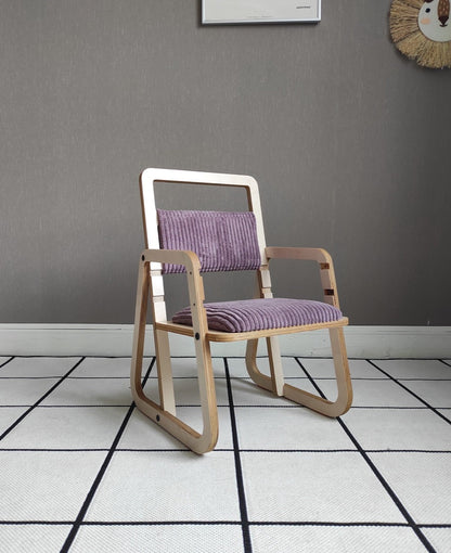 Cannon pink Montessori chair with white frame and padded seat viewed from front