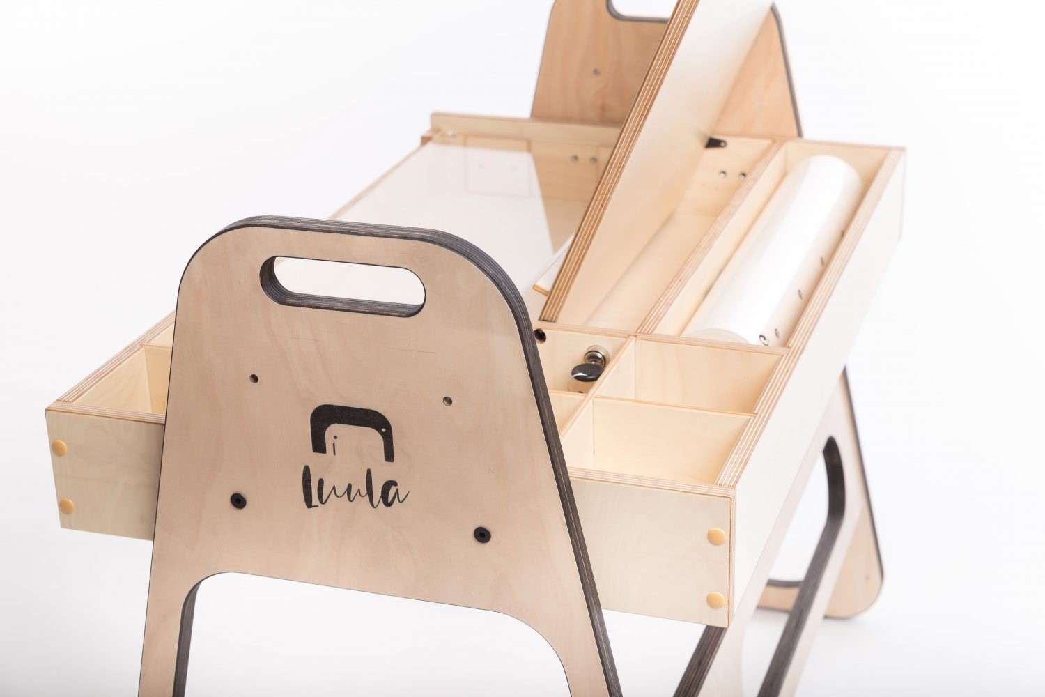 Montessori table with paper roll dispenser and organized supply compartments