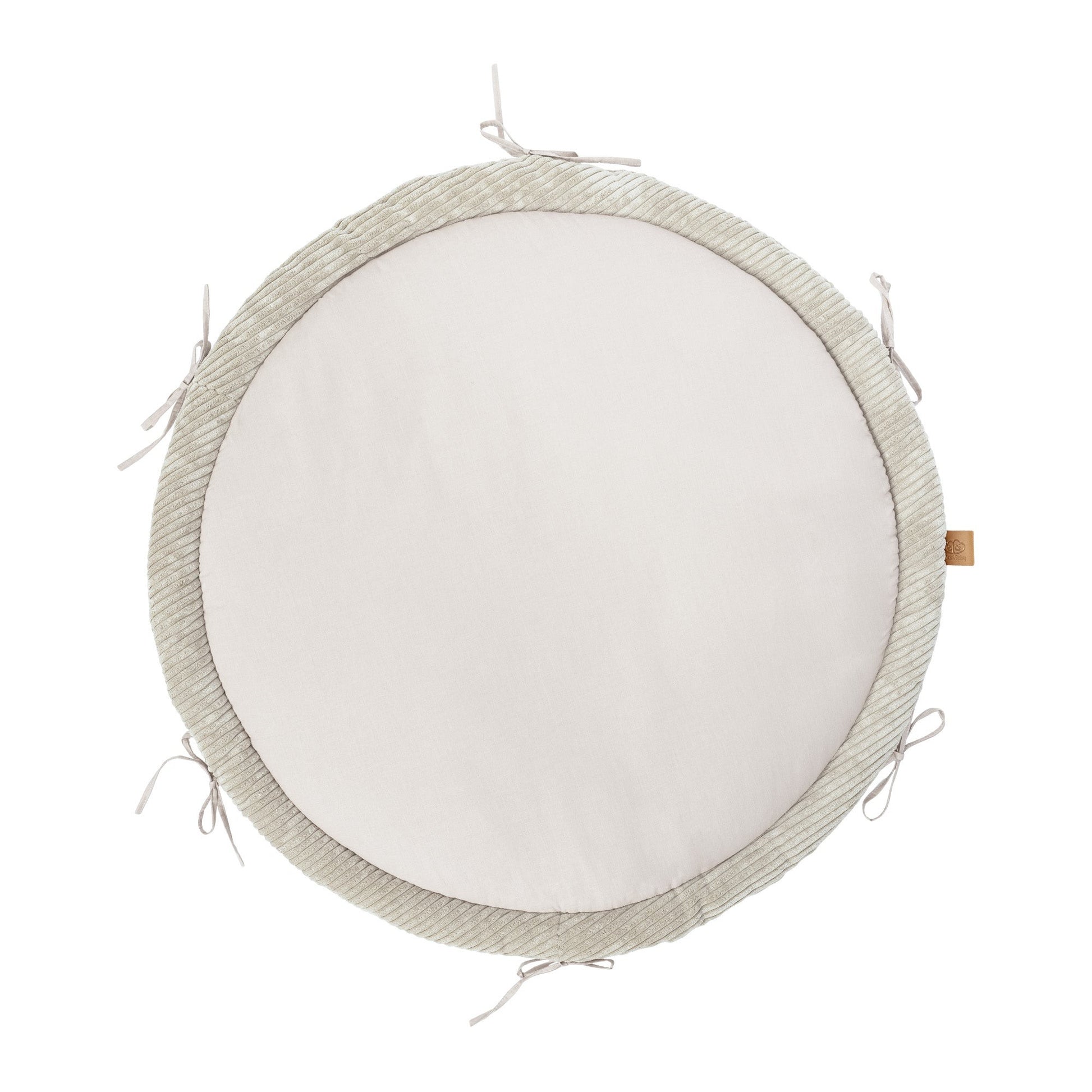 Ecru baby nest play mat top view displaying soft cotton center and braided crib bumper edge