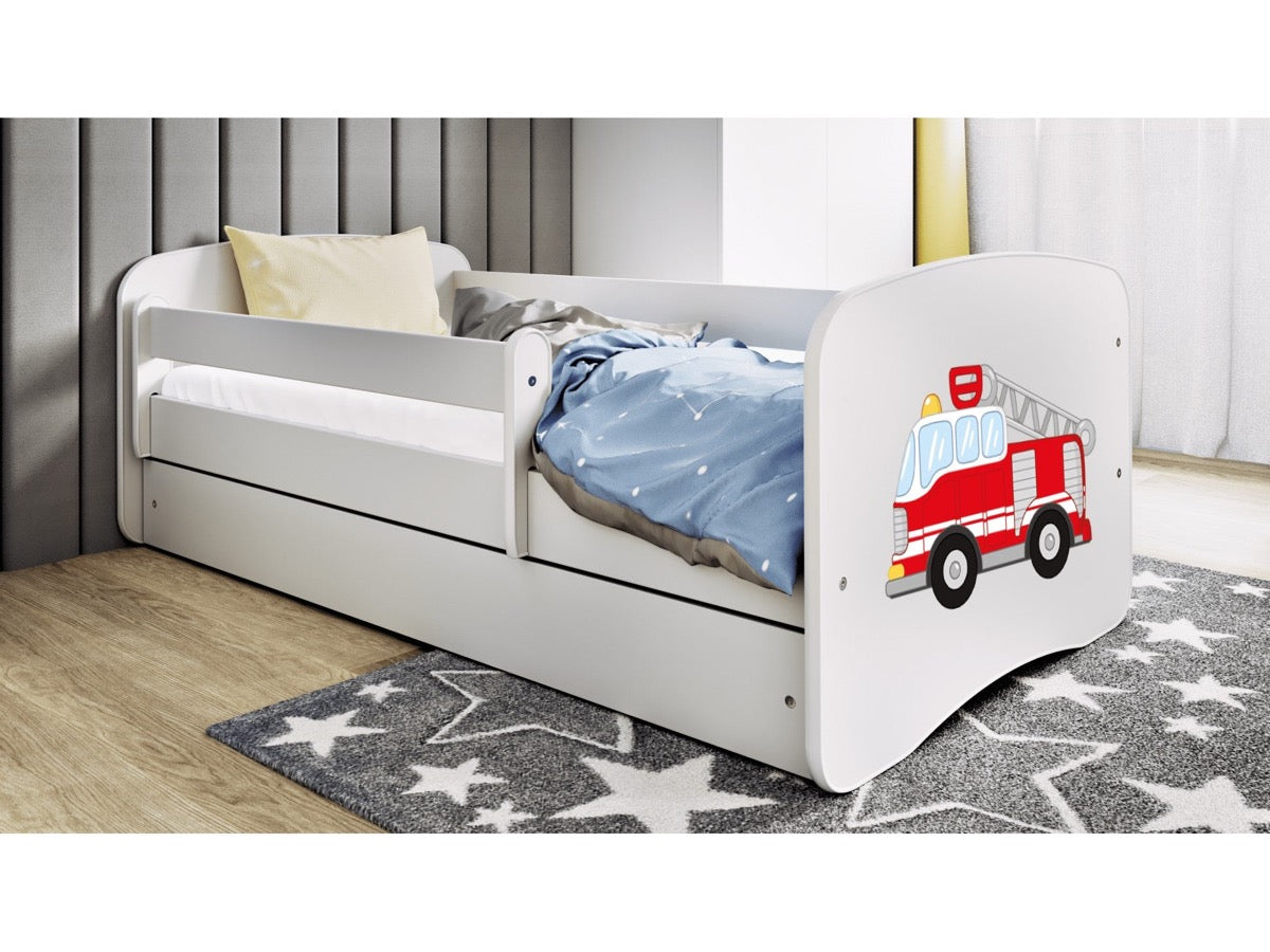 White fire truck children's bed with guardrail and storage drawer in bedroom setting