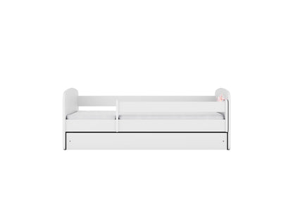 White children's bed viewed from front showing guardrail and storage drawer