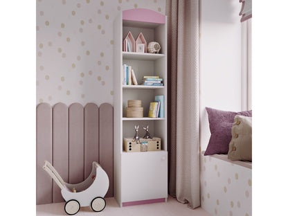 Pink and white kids shelf with four open shelves and closed storage, styled in bedroom with books and decor