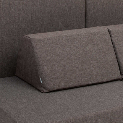Close-up of dark brown textured foam cushion showing fabric detail and quality