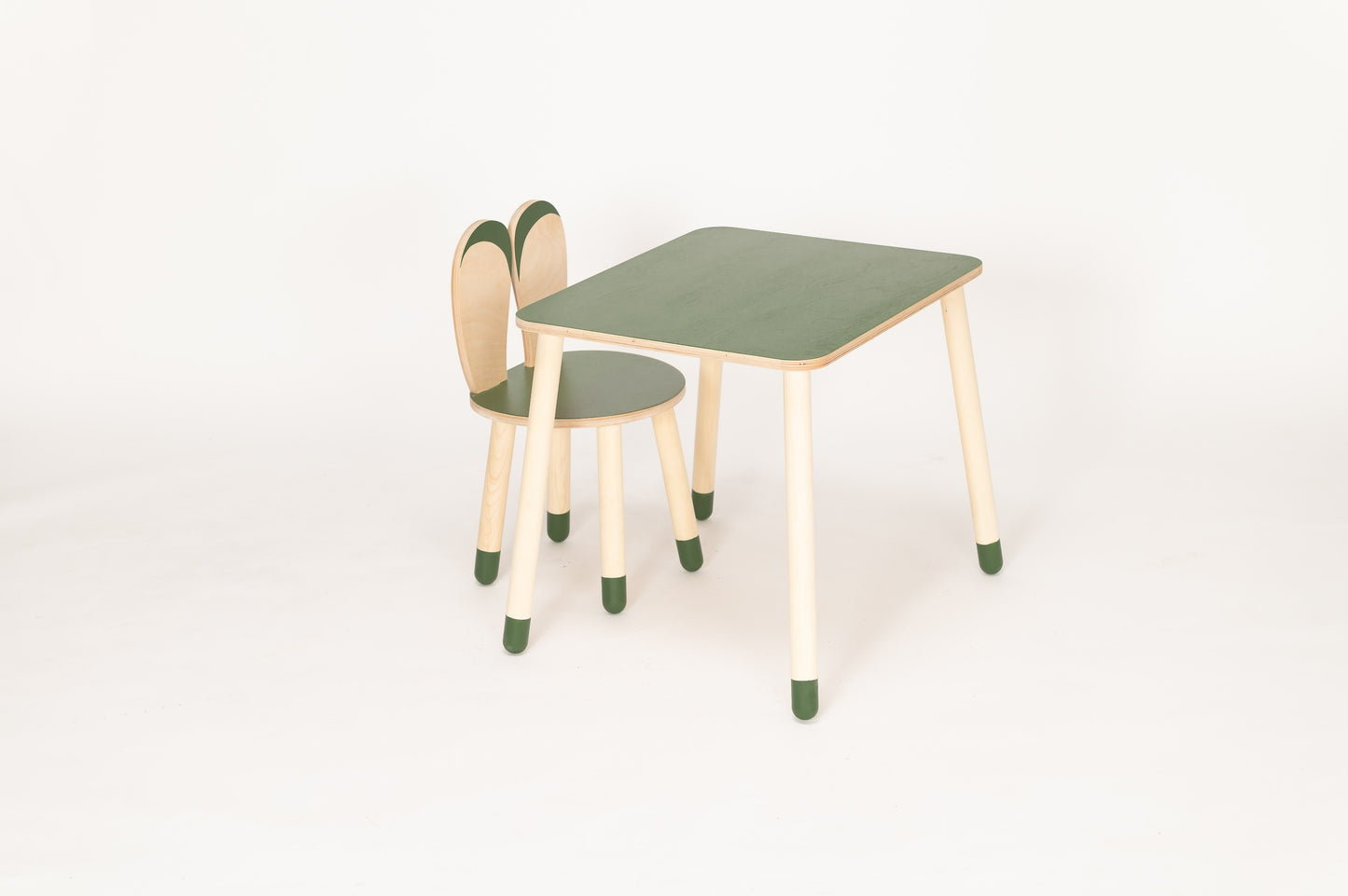 Green wooden bunny table and chair set with bunny-shaped backrest, product display view