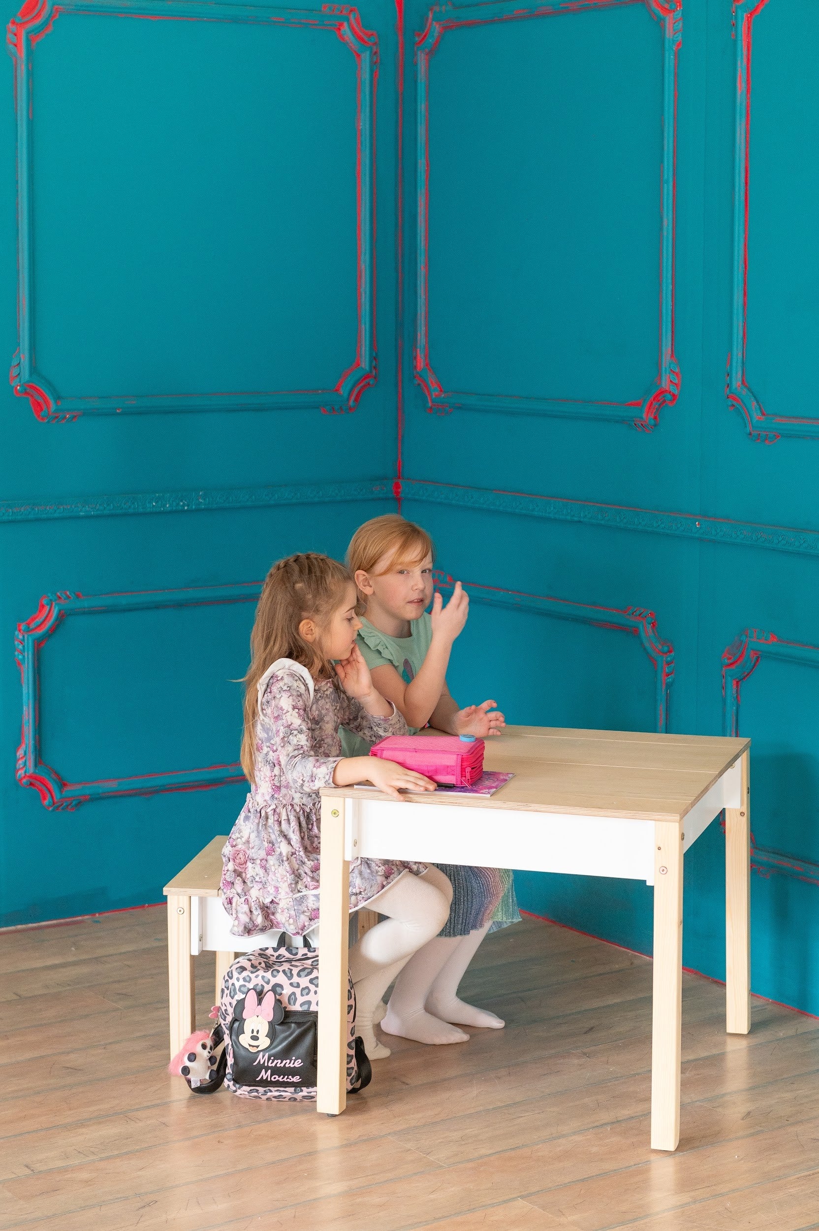 Wooden kids table with gray storage compartment and hinged lid included