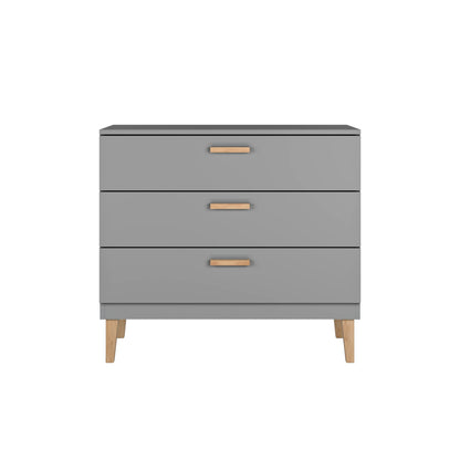 Kubi grey three-drawer chest with oak legs and handles, front perspective view