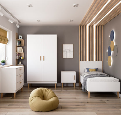 White Kubi chest of drawers styled in Scandinavian children's bedroom with matching furniture