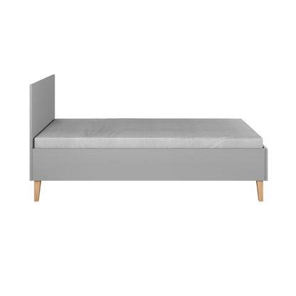 Grey Kubi children's bed side profile showing oak legs and low frame design