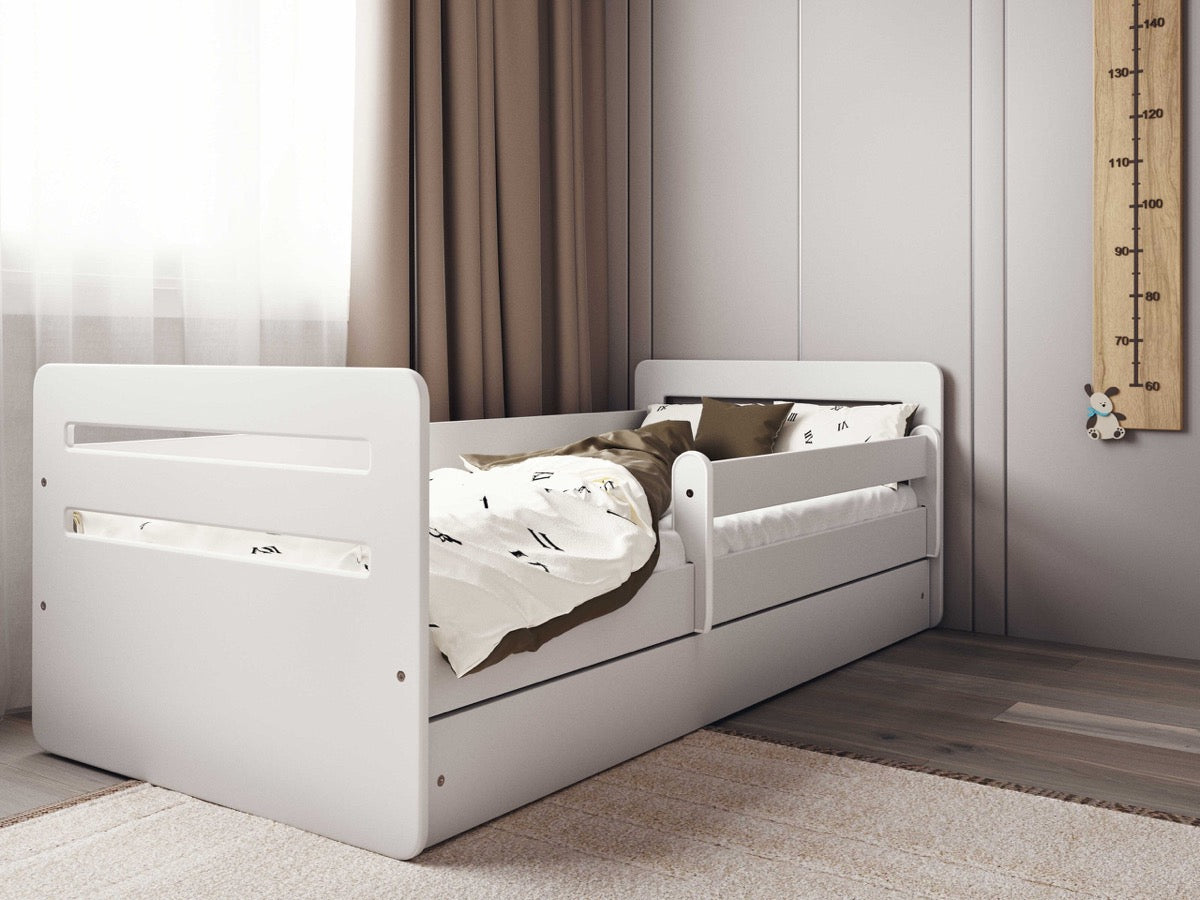 White Tomi kids bed with safety guardrail and storage drawer, front angle view