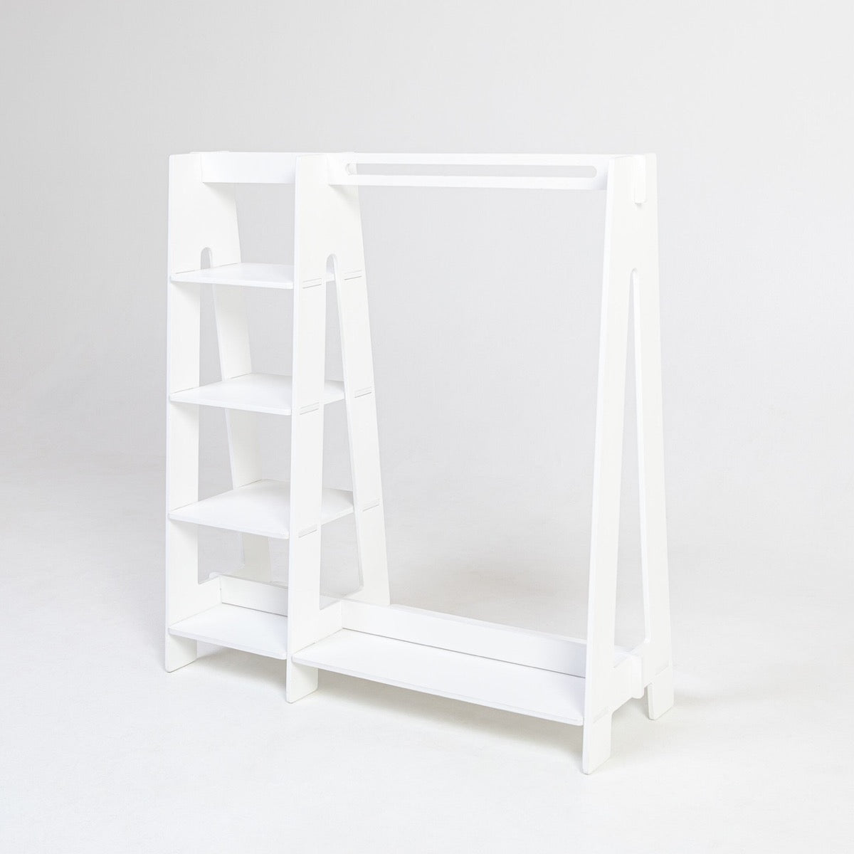 White painted Montessori house bed clothing rack with open shelves, side view