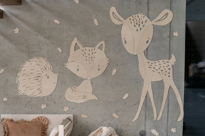 Collection of forest animals wooden wall decorations including deer, fox, and hedgehog
