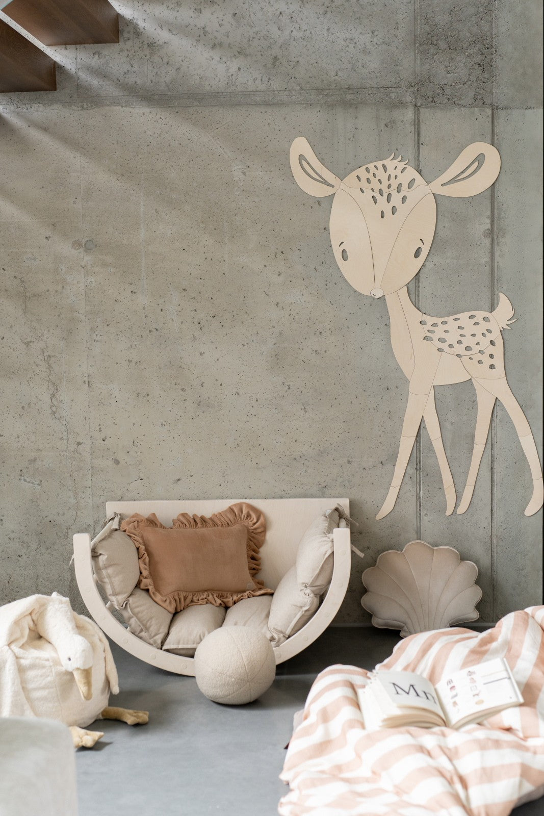 Wooden forest animal deer wall hanging in modern playroom setup