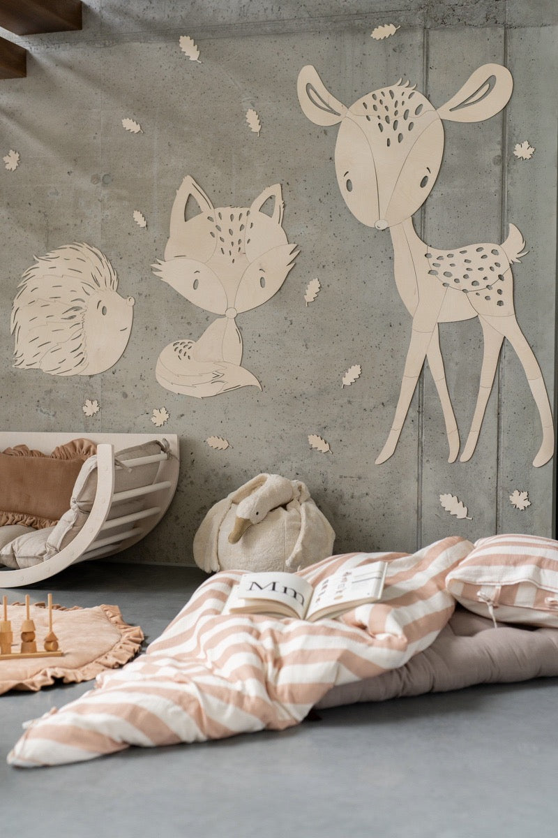Forest animal wooden wall decals featuring spotted deer, fox, and hedgehog in nursery