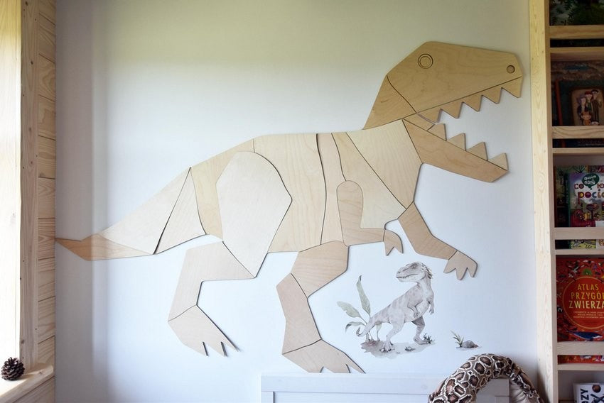 Close-up of wooden T-Rex wall decoration showing puzzle-style assembly and detailed plywood construction