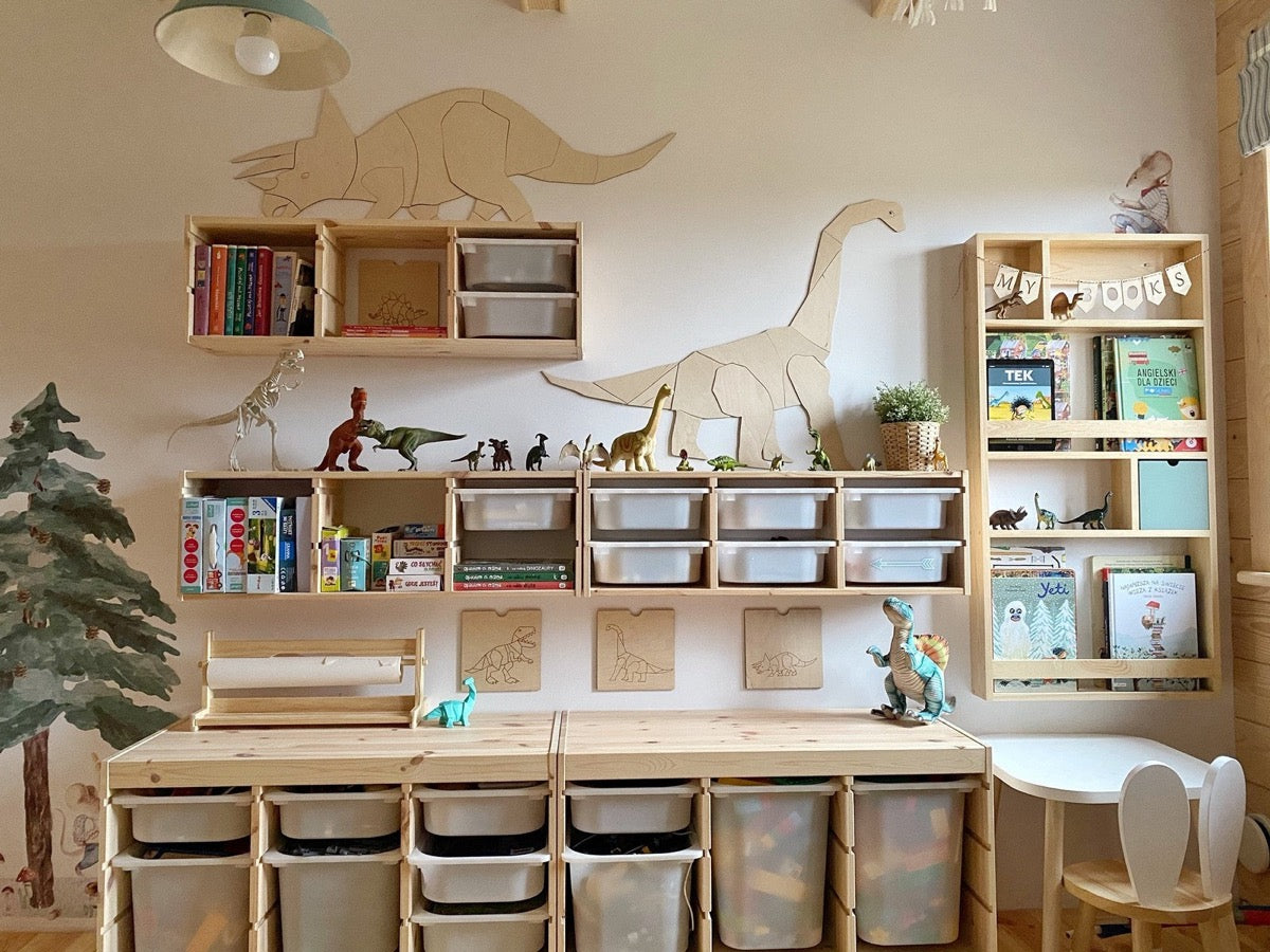Assembled triceratops wooden wall art displayed above playroom storage shelves and toy organization