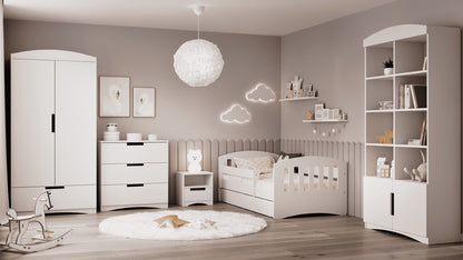 White double bookshelf in modern gray and white nursery with crib and accessories
