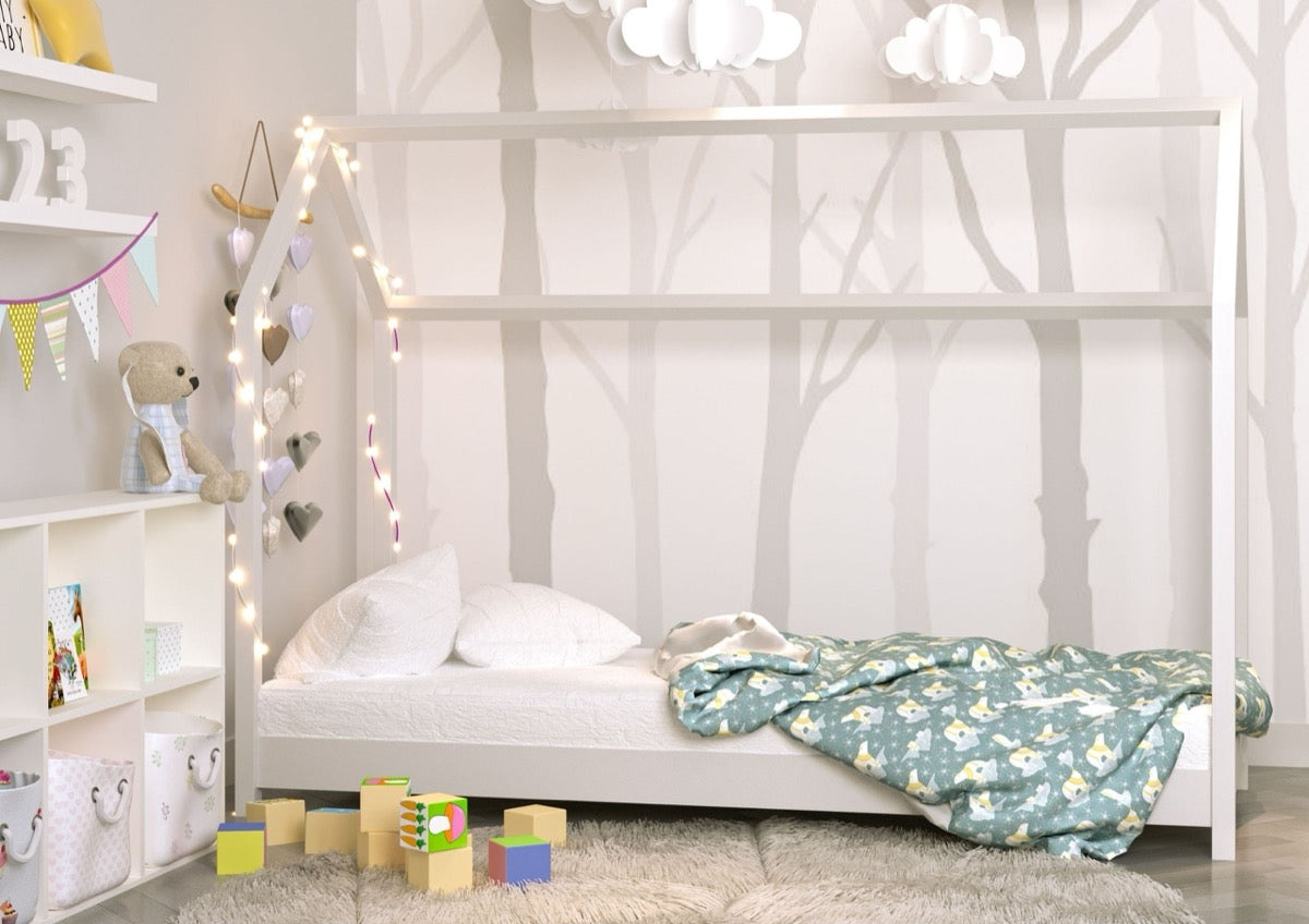 White pine Bella house bed with low floor frame and playful roof design in nursery