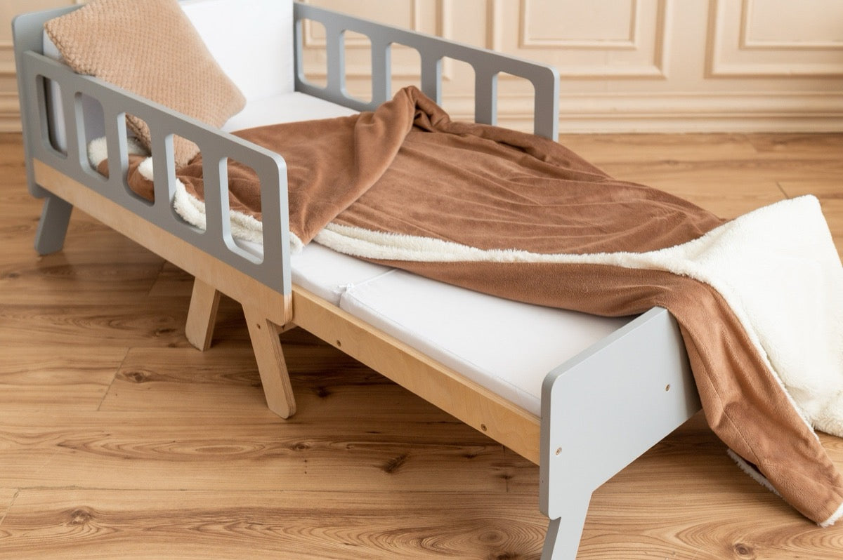 Close-up angle of gray Family-scl growing bed safety rail – solid wood kids bed construction for toddler safety