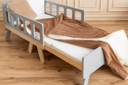 Close-up angle of gray Family-scl growing bed safety rail – solid wood kids bed construction for toddler safety