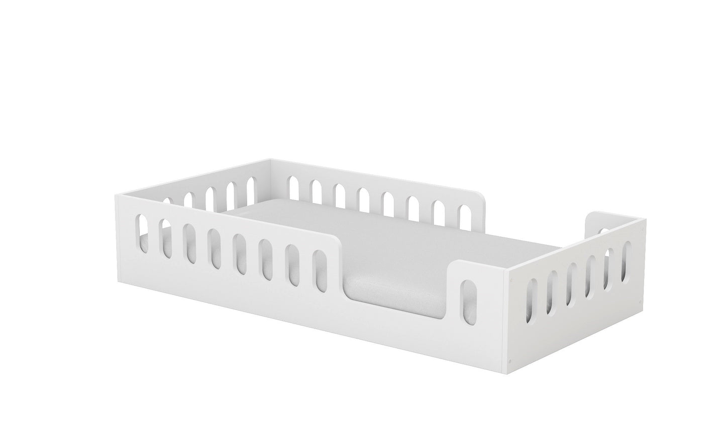 White low-profile Montessori bed frame with safety rails and slot design