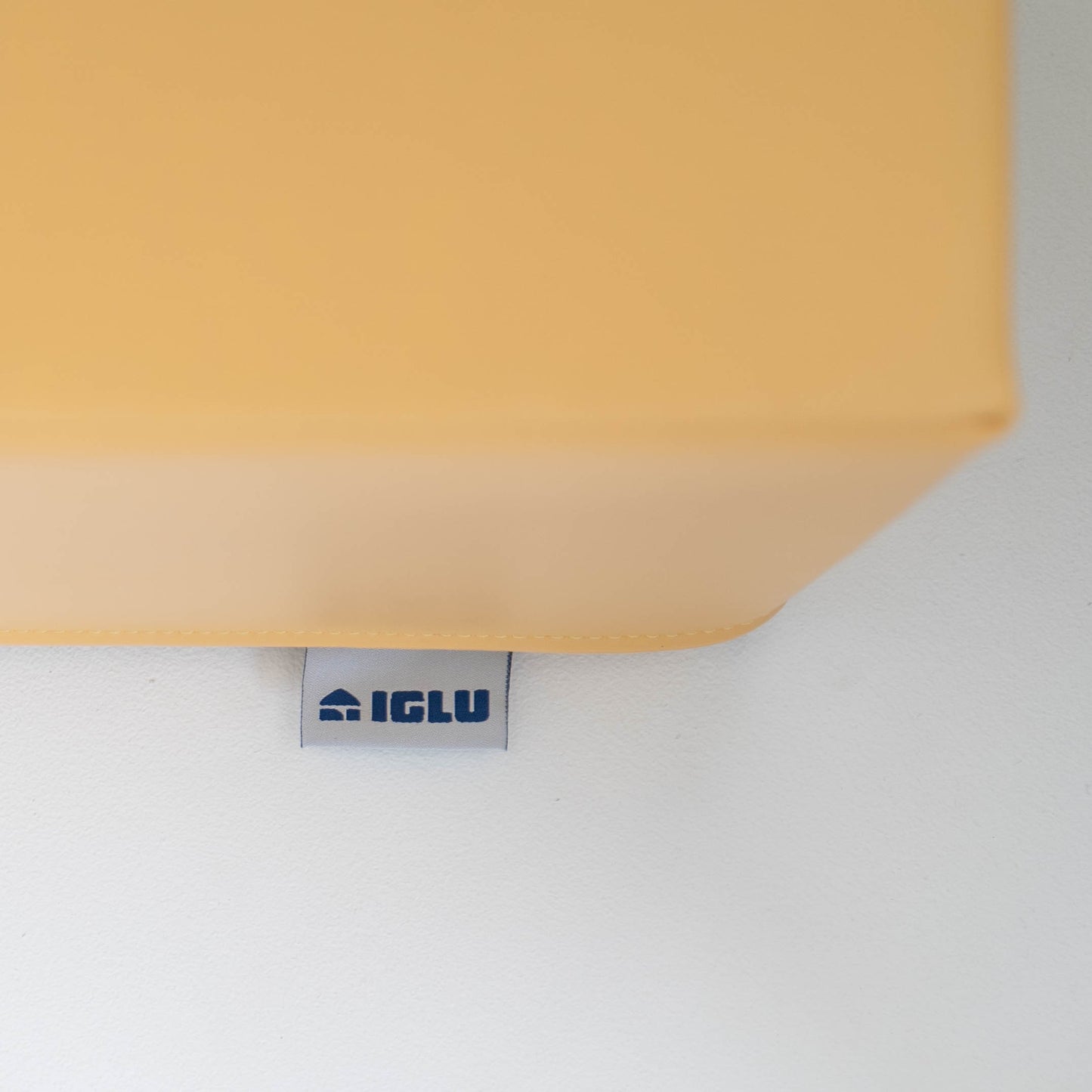 IGLU brand label visible on edge of pastel yellow foam block