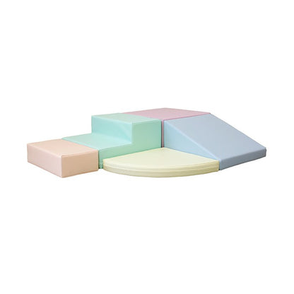 Pastel foam corner climber blocks arranged in L-shape configuration