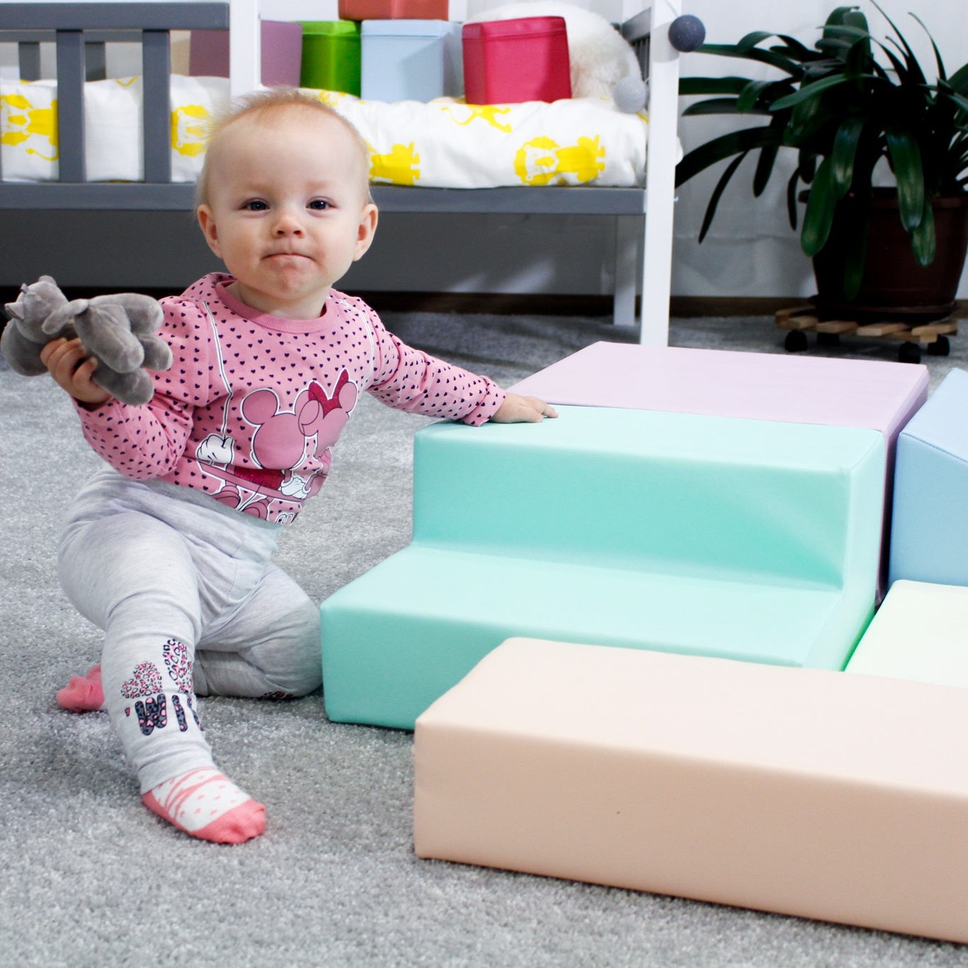 Woman demonstrating lightweight and portable pastel foam block set