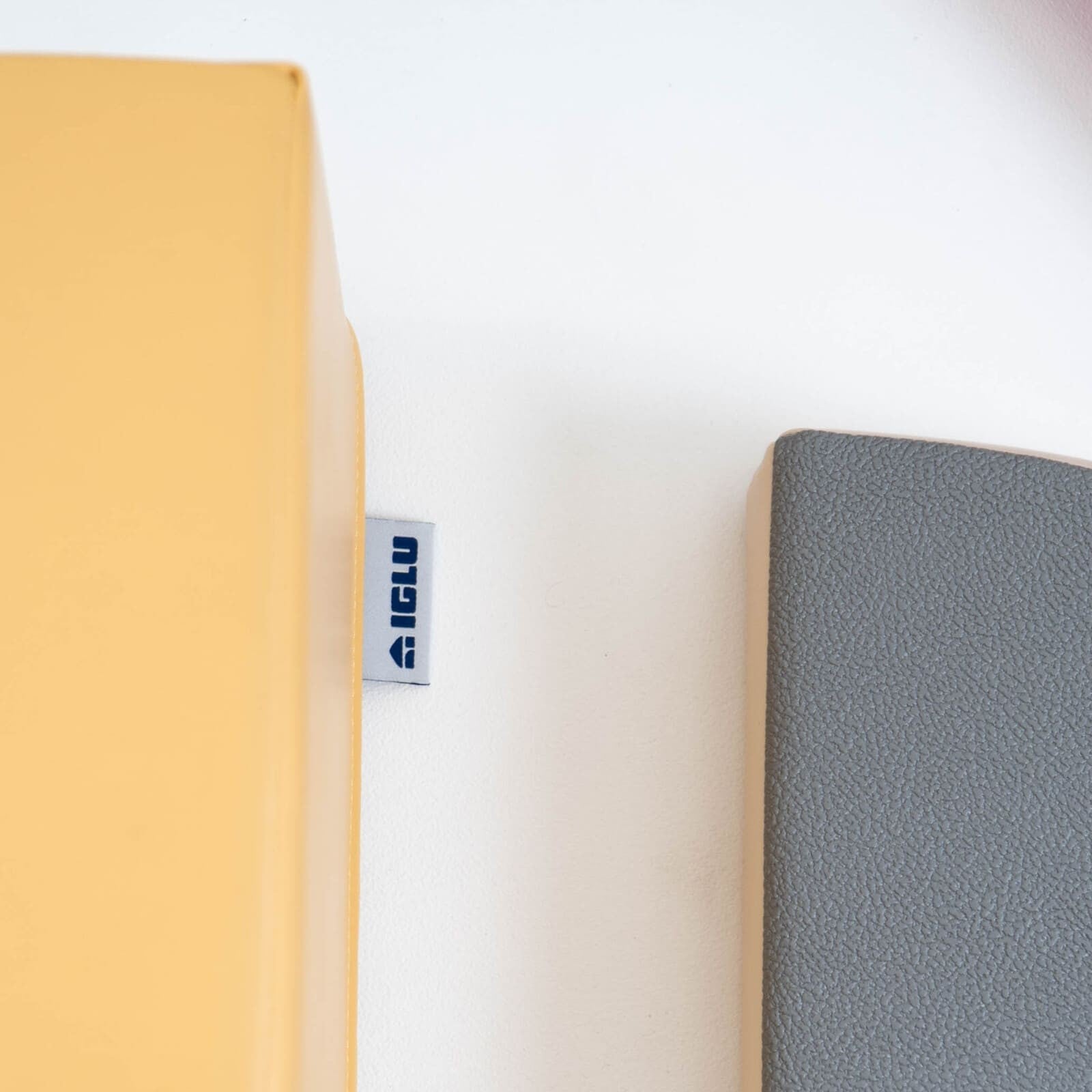 Close-up of IGLU brand label on yellow foam block