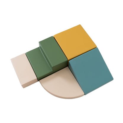 IGLU corner climber set with five foam blocks in pastel turquoise, cream, sage green and mustard yellow from side angle