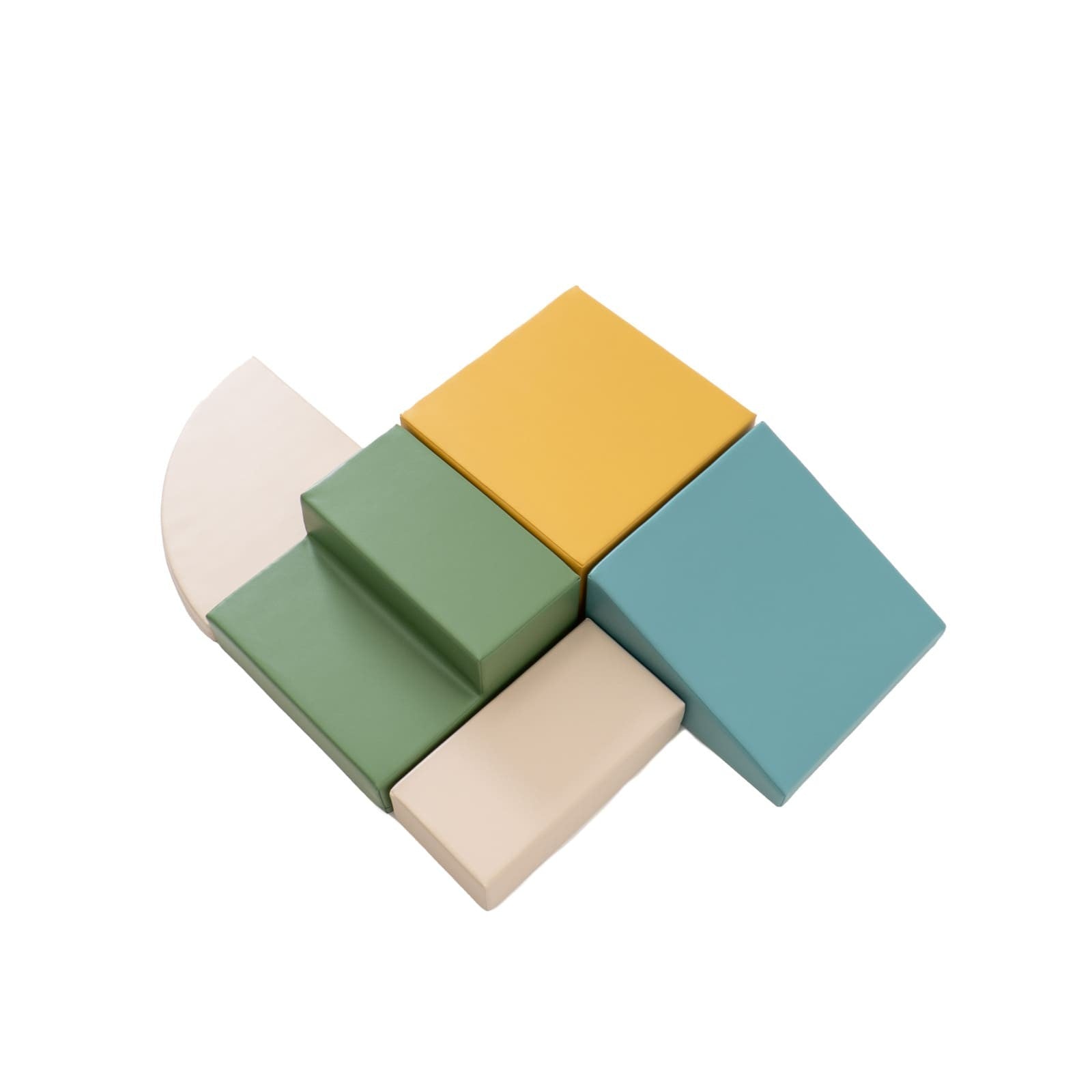 Top-down view of five-piece foam block set arranged in compact formation showing turquoise, green, cream and gold colors