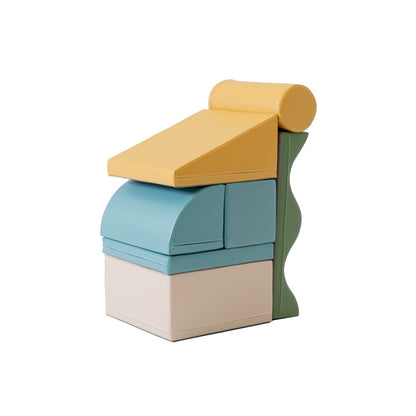IGLU foam climbing set stacked with yellow ramp, curved turquoise pieces, and cream platform at front