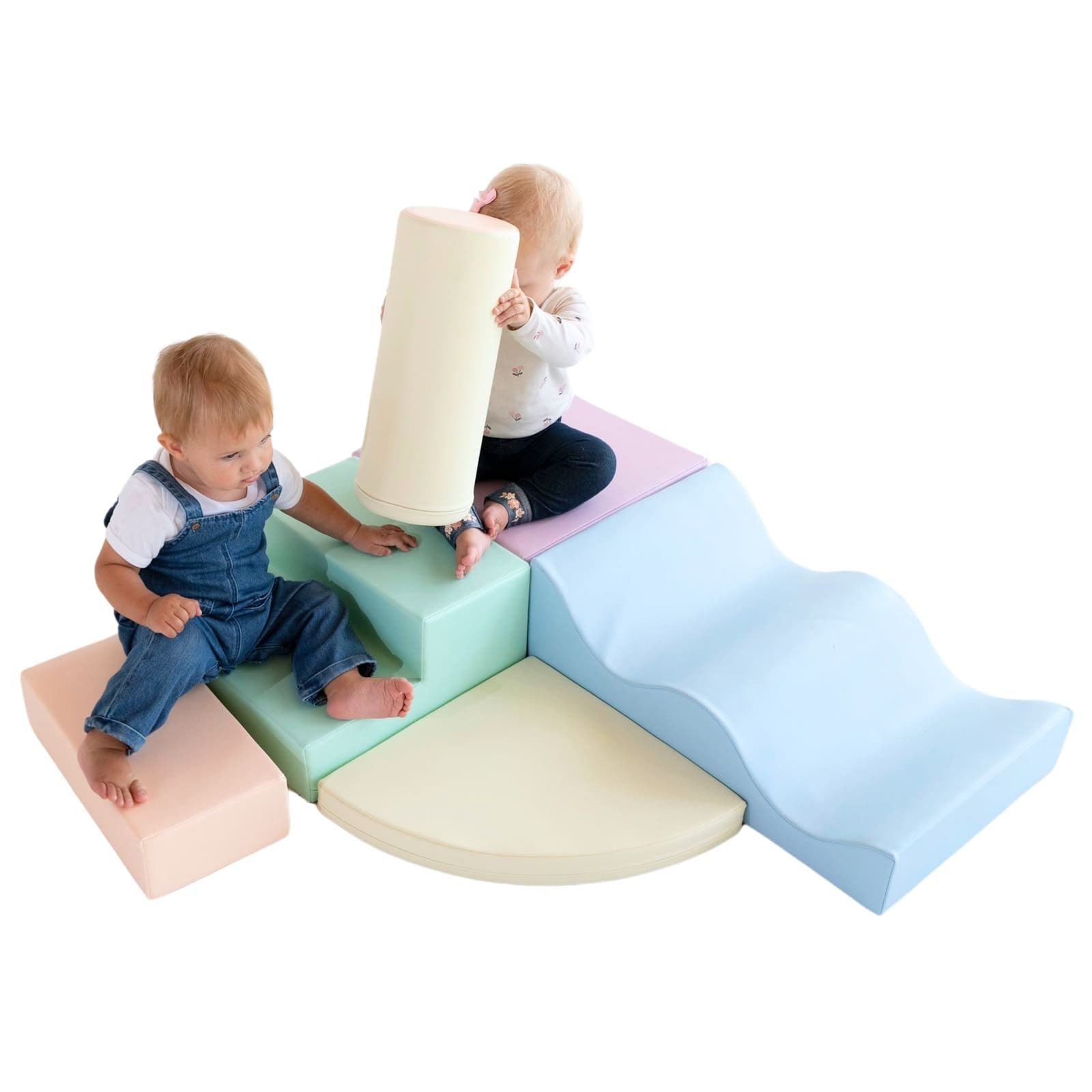 Two toddlers at rest on light pastel foam block climbing structure
