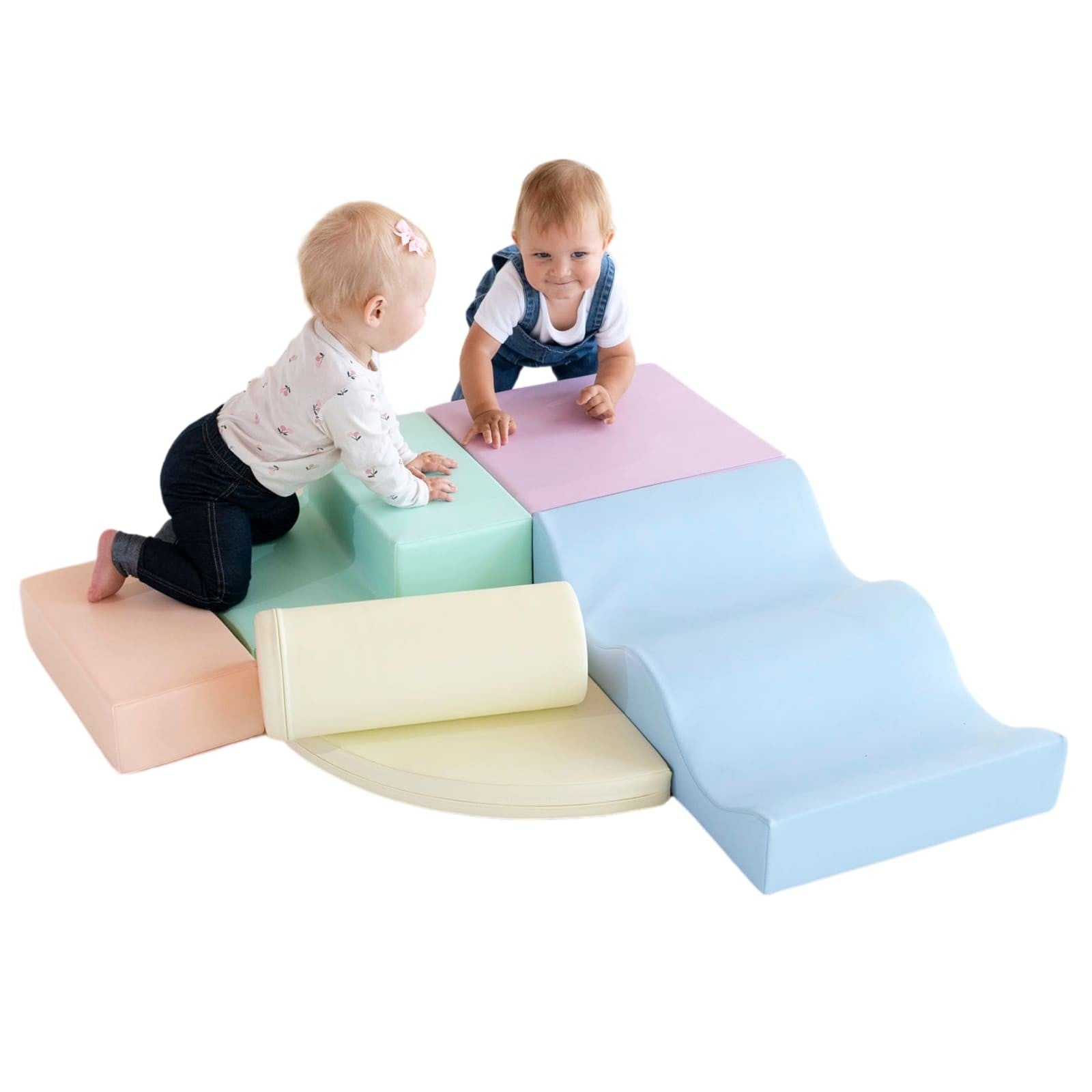 Toddler resting on light pastel foam block structure with stored blocks below